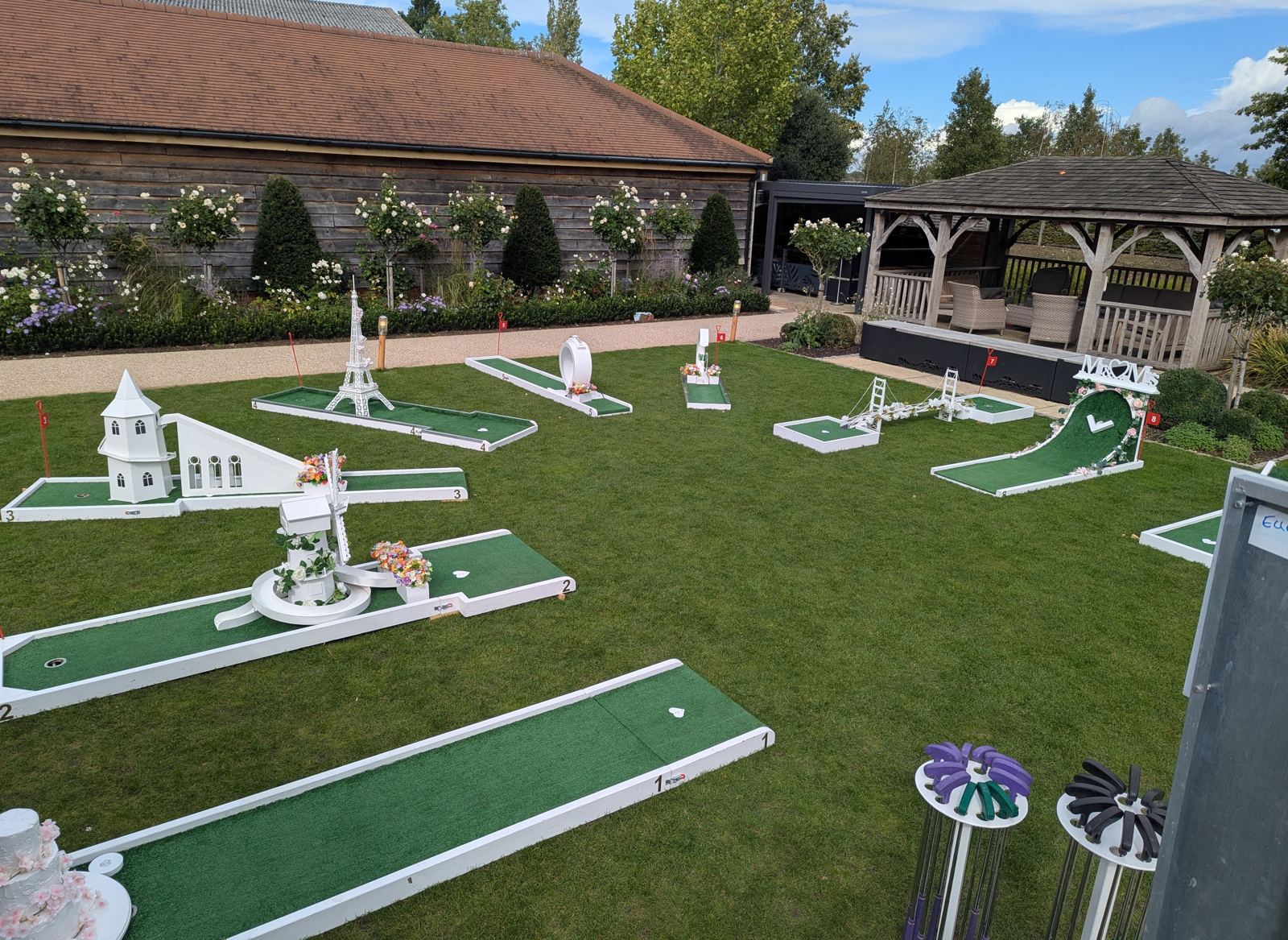 Guests playing wedding crazy golf at Bassmead Manor Barns