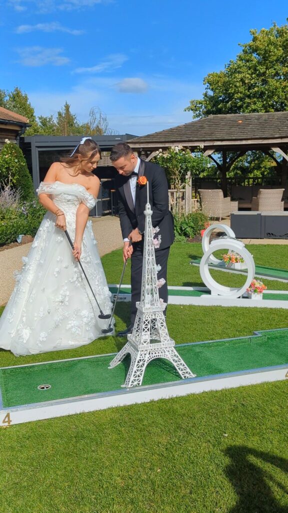 Guests playing wedding crazy golf at Bassmead Manor Barns