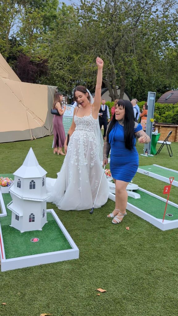 Guests playing wedding crazy golf at Carlton Manor