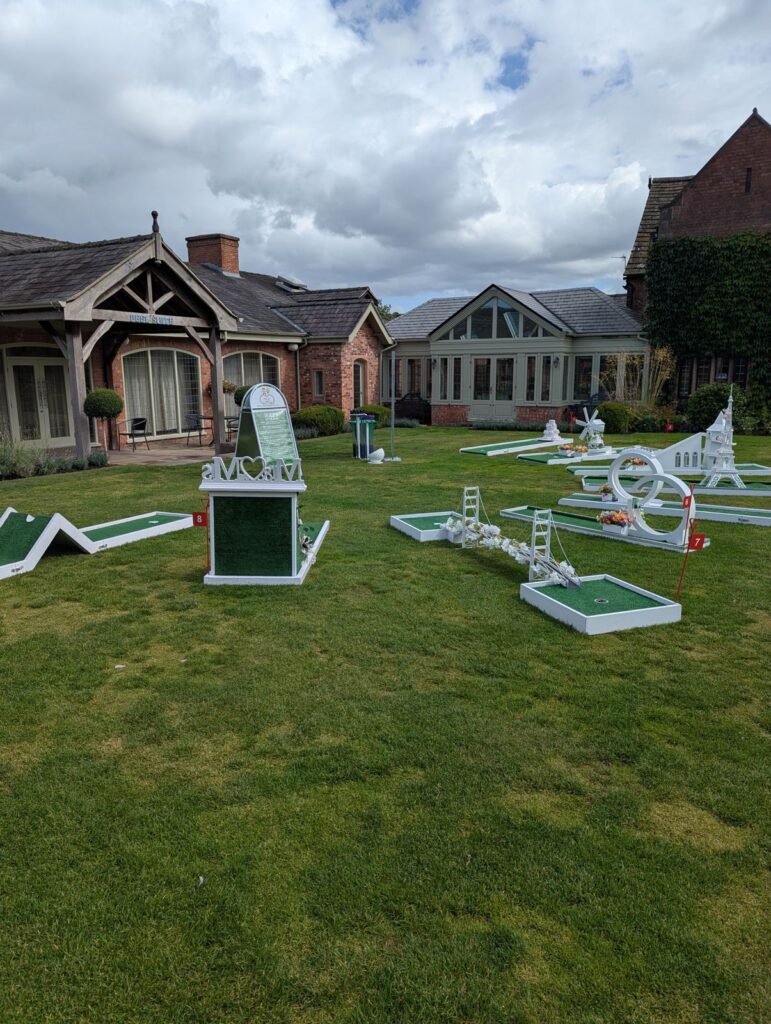 Guests playing wedding crazy golf at Colshaw Hall