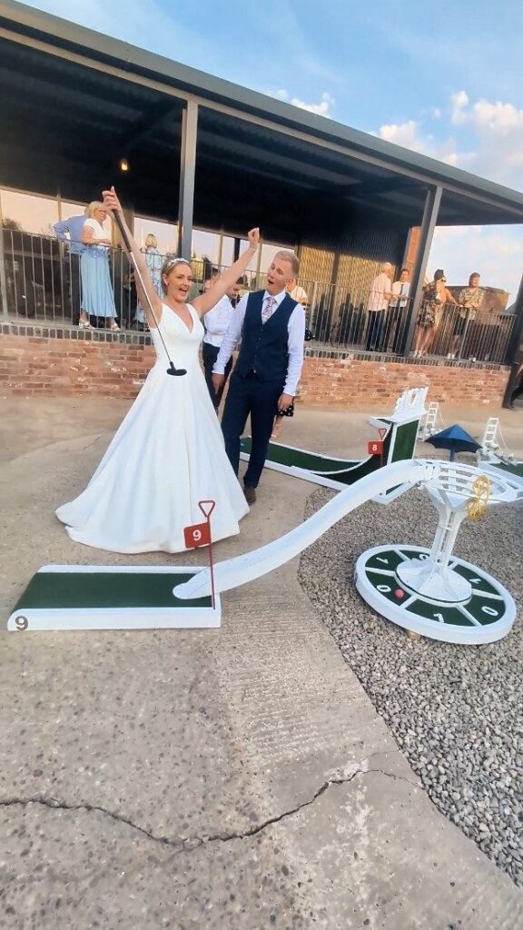 Guests playing wedding crazy golf at Grangefields Barn