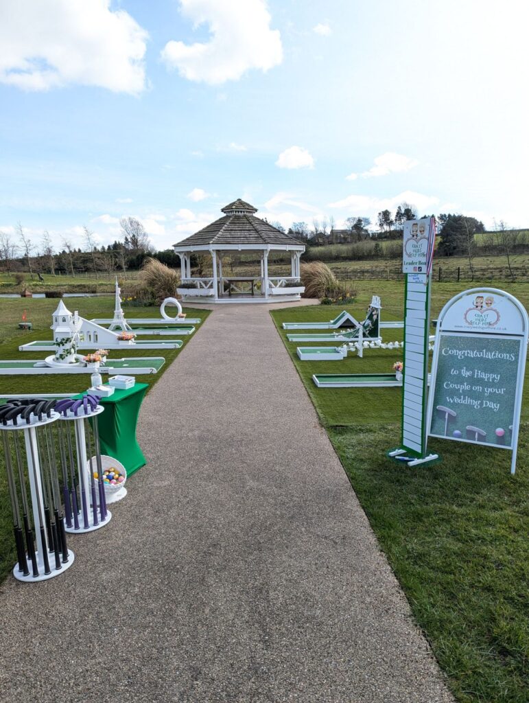 Guests playing wedding crazy golf at The Peak Edge Hotel