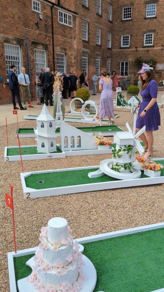 Guests playing wedding crazy golf at The West Mill