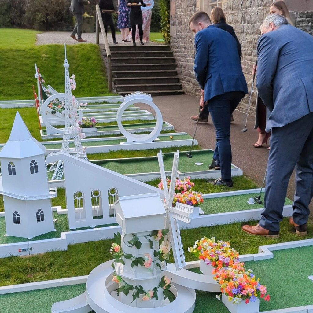 Guests playing wedding crazy golf at Tissington Hall
