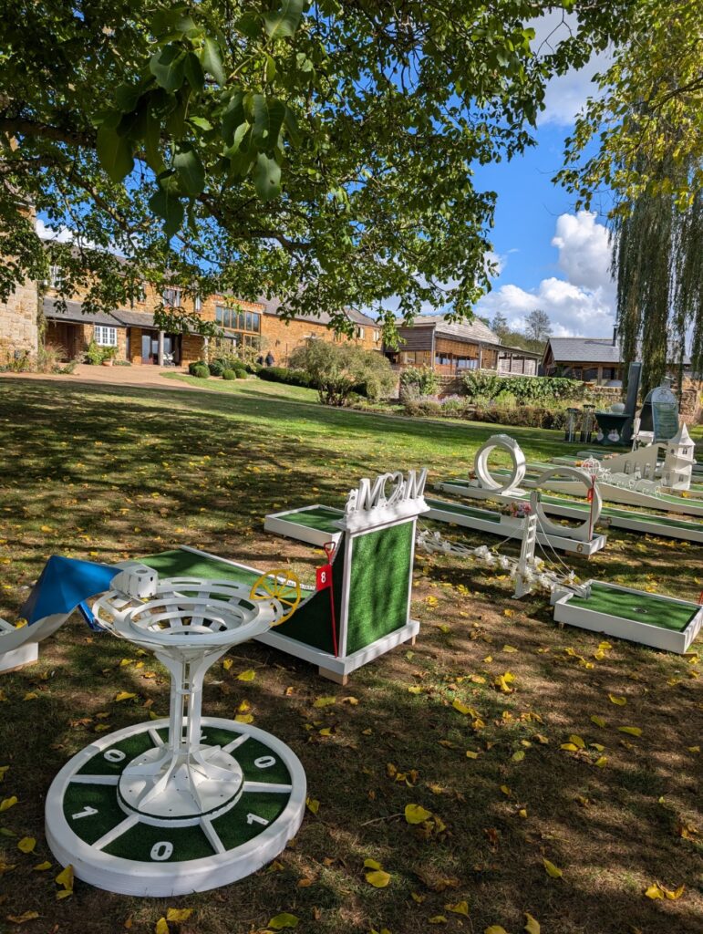 Wedding crazy golf holes beside the farm buildings at Crockwell Farm