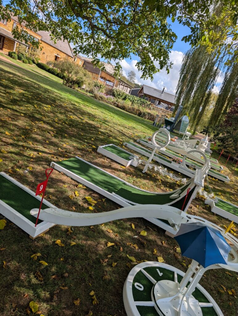 Crazy golf holes beneath the weeping willow at Crockwell Farm