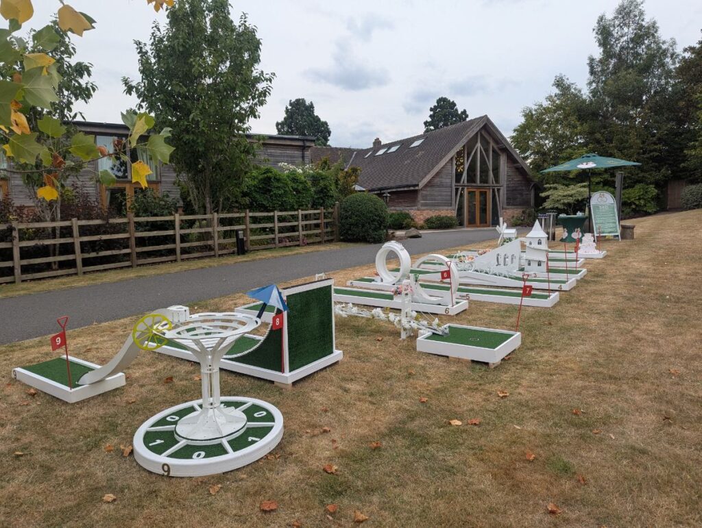 The Crazy Weds wedding crazy golf course on the lawn beside the barns at Mythe Barn