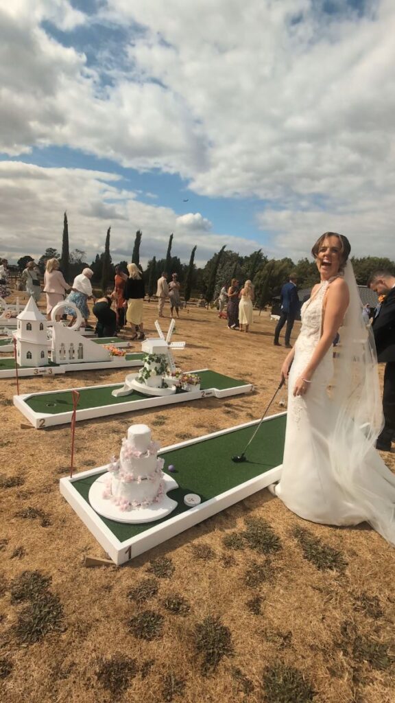 Wedding guests playing crazy golf at The Willow Marsh Farm